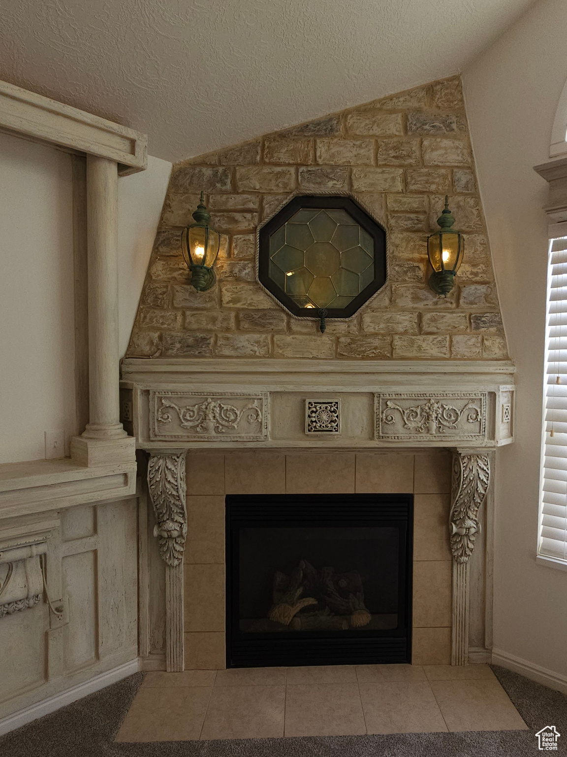 One-of-a-kind European-styled fireplace and hearth warms the great room.