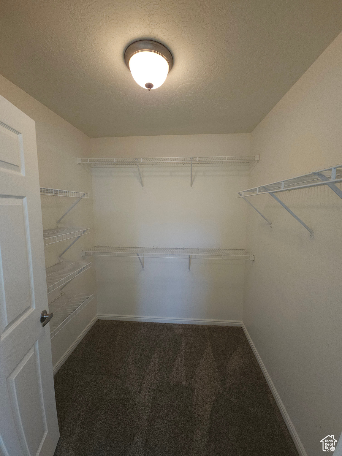 Large walk-in closet at the back of the Primary bath.