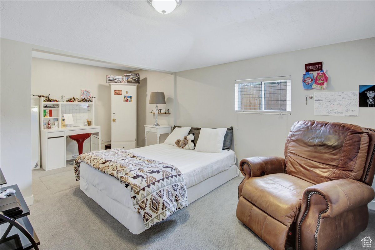 Bedroom featuring carpet floors