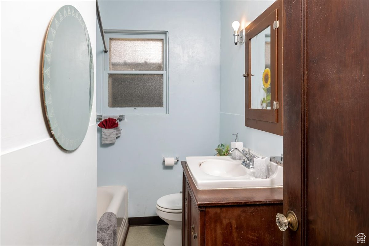 Bathroom with vanity and toilet