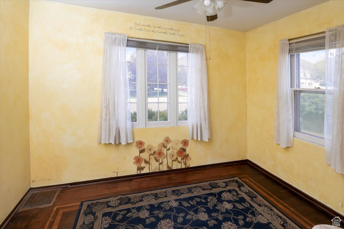 Dining Area features hardwood / wood-style floors and a ceiling fan