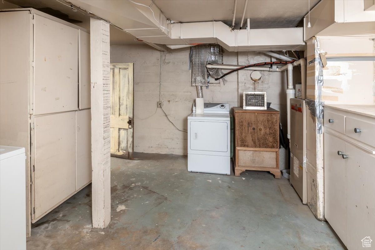 Basement with washer / dryer and storage