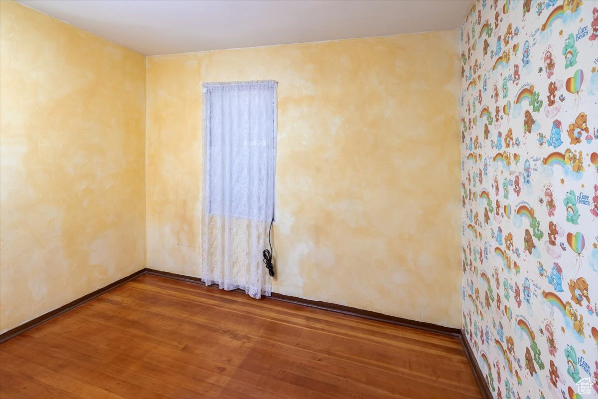 Bedroom 2 with hardwood / wood-style floors