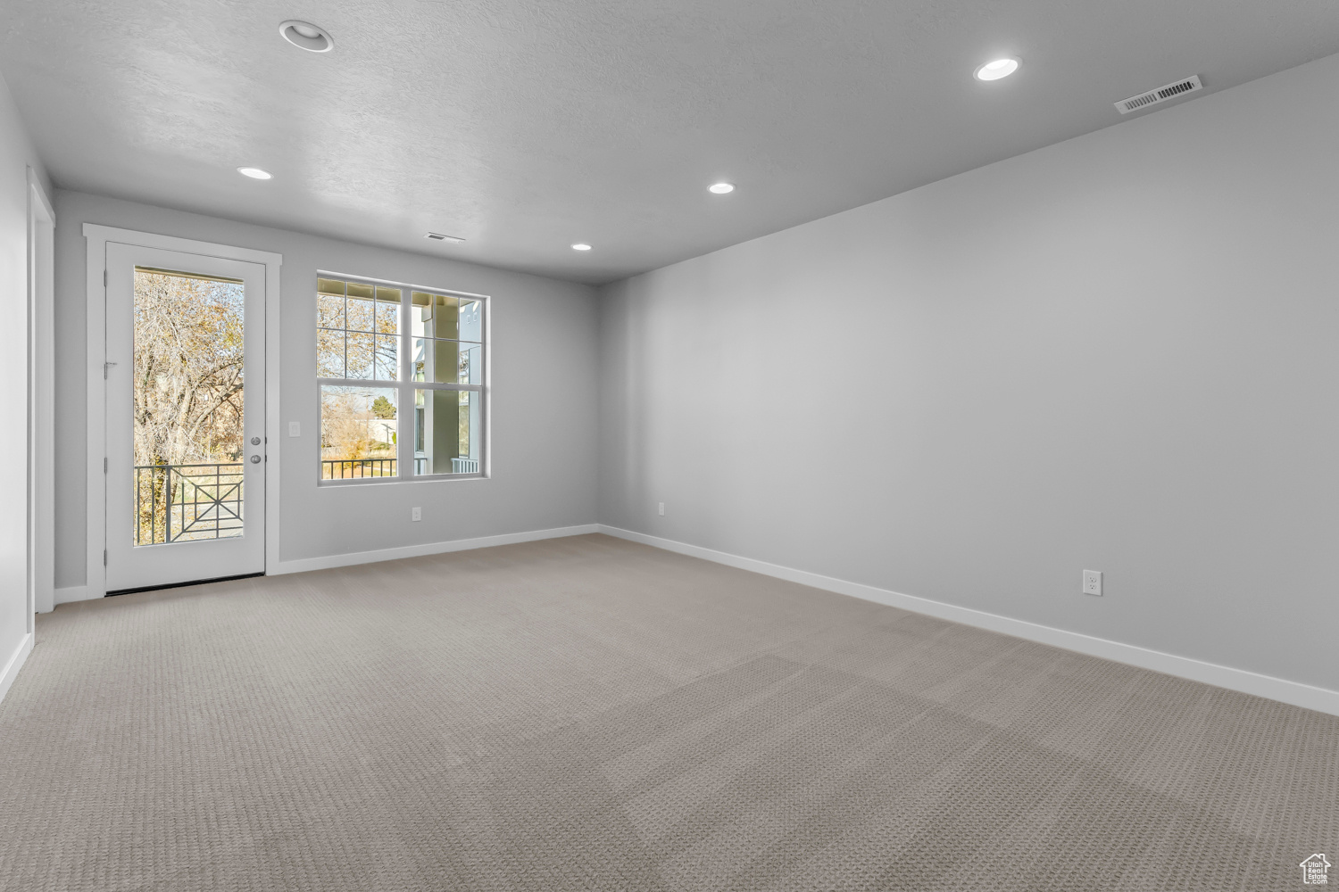 View of carpeted spare room