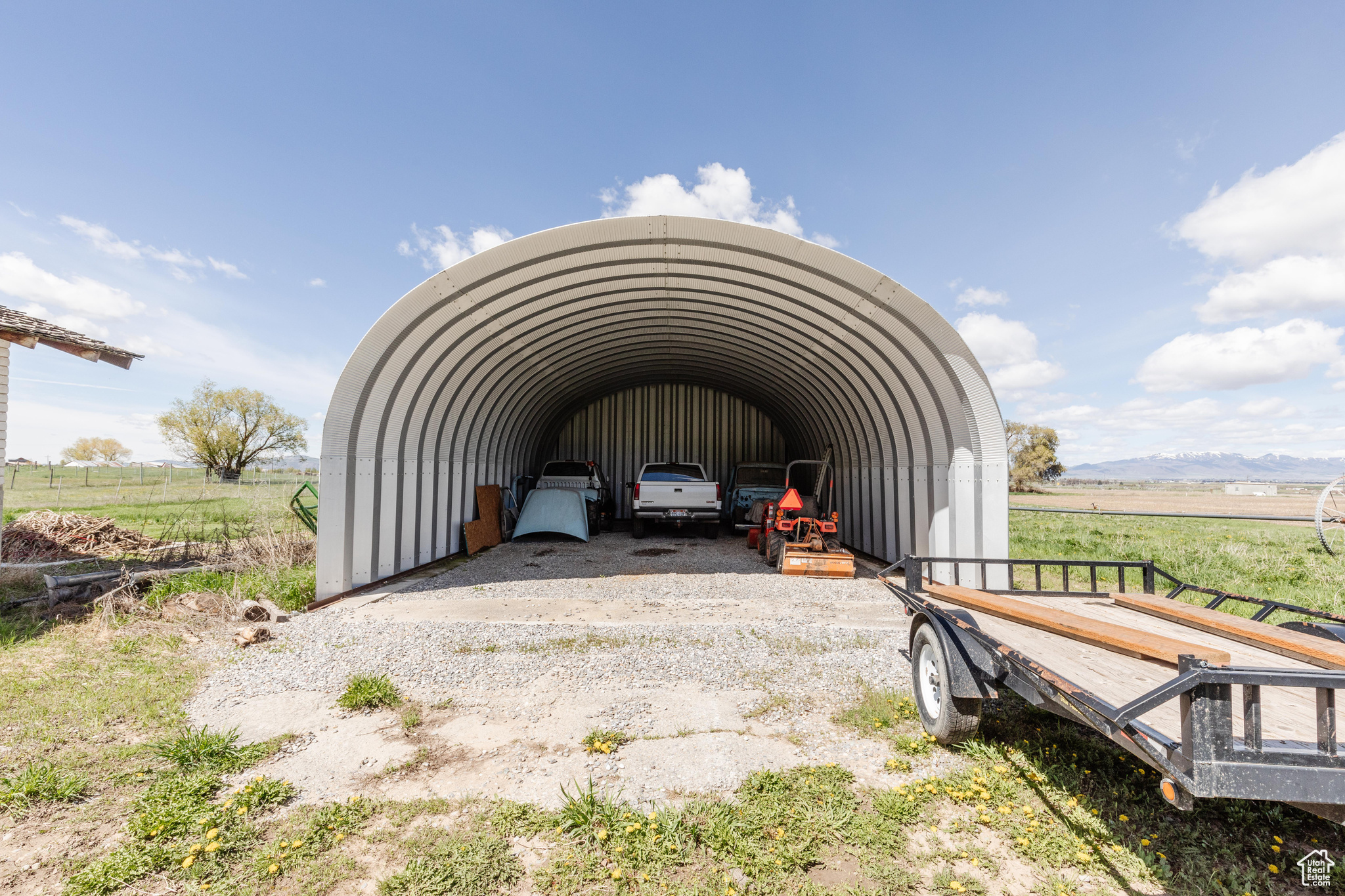 View of shed / structure with a rural view and a carport