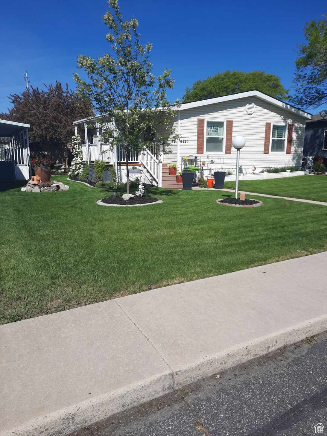 Front of Home - Beautiful Landscaped Yard!