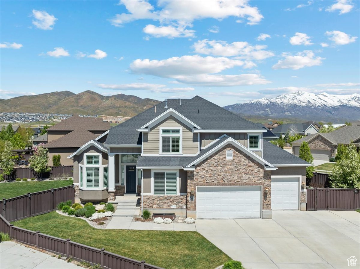Craftsman-style home featuring a mountain view
