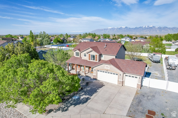 Birds eye view of property with a mountain backdrop!