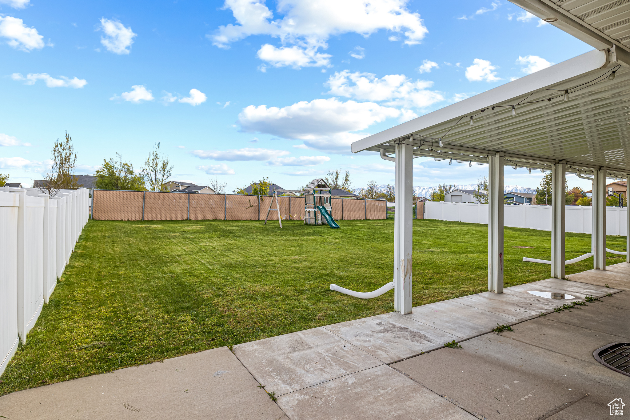 View of yard featuring a playground