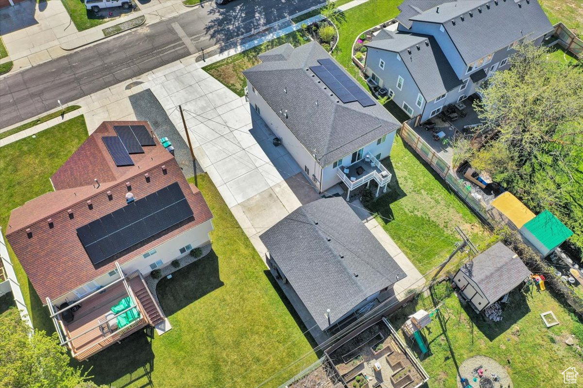 Aerial view of home and extra long driveway