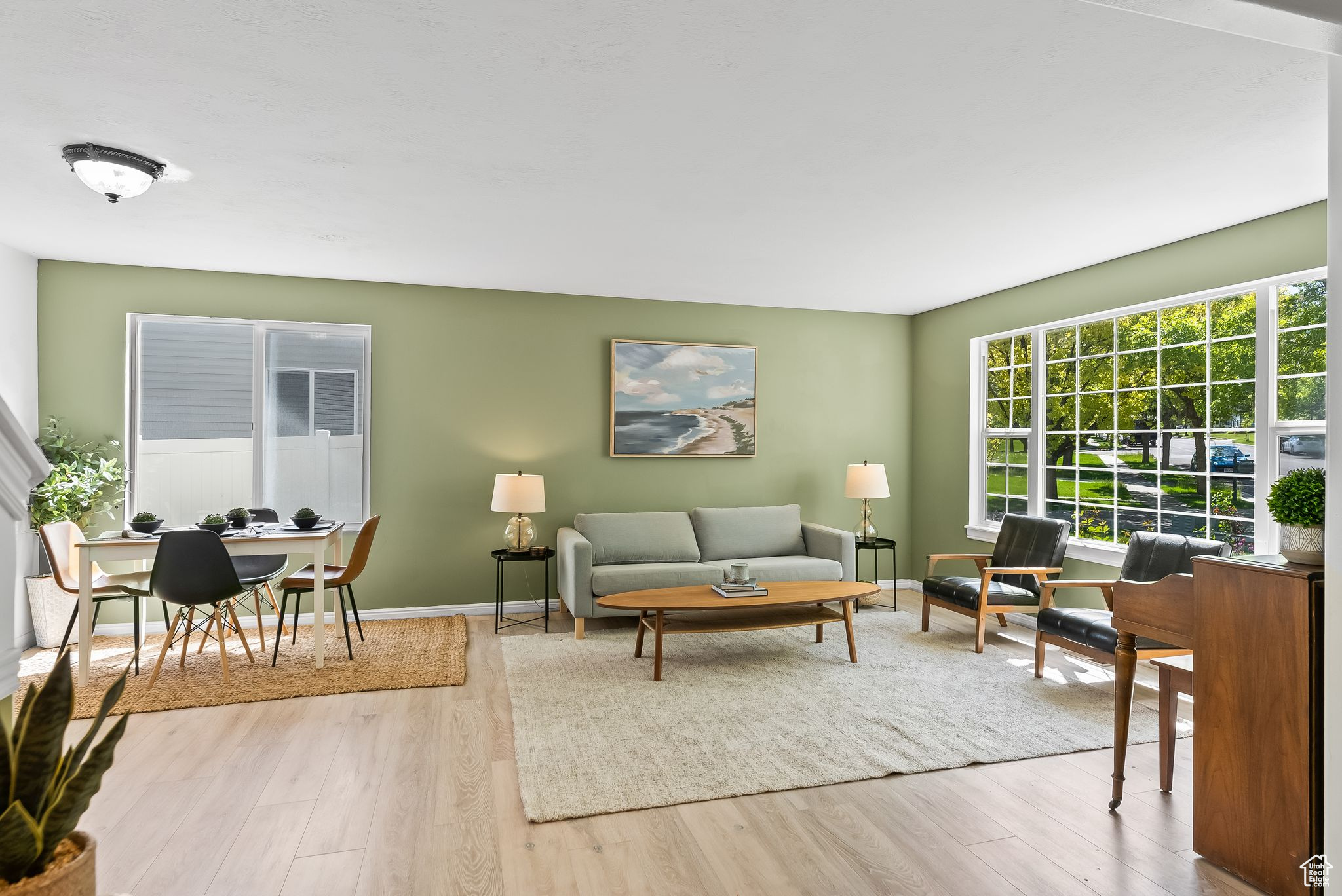 Living room featuring light hardwood / wood-style floors and plenty of natural light