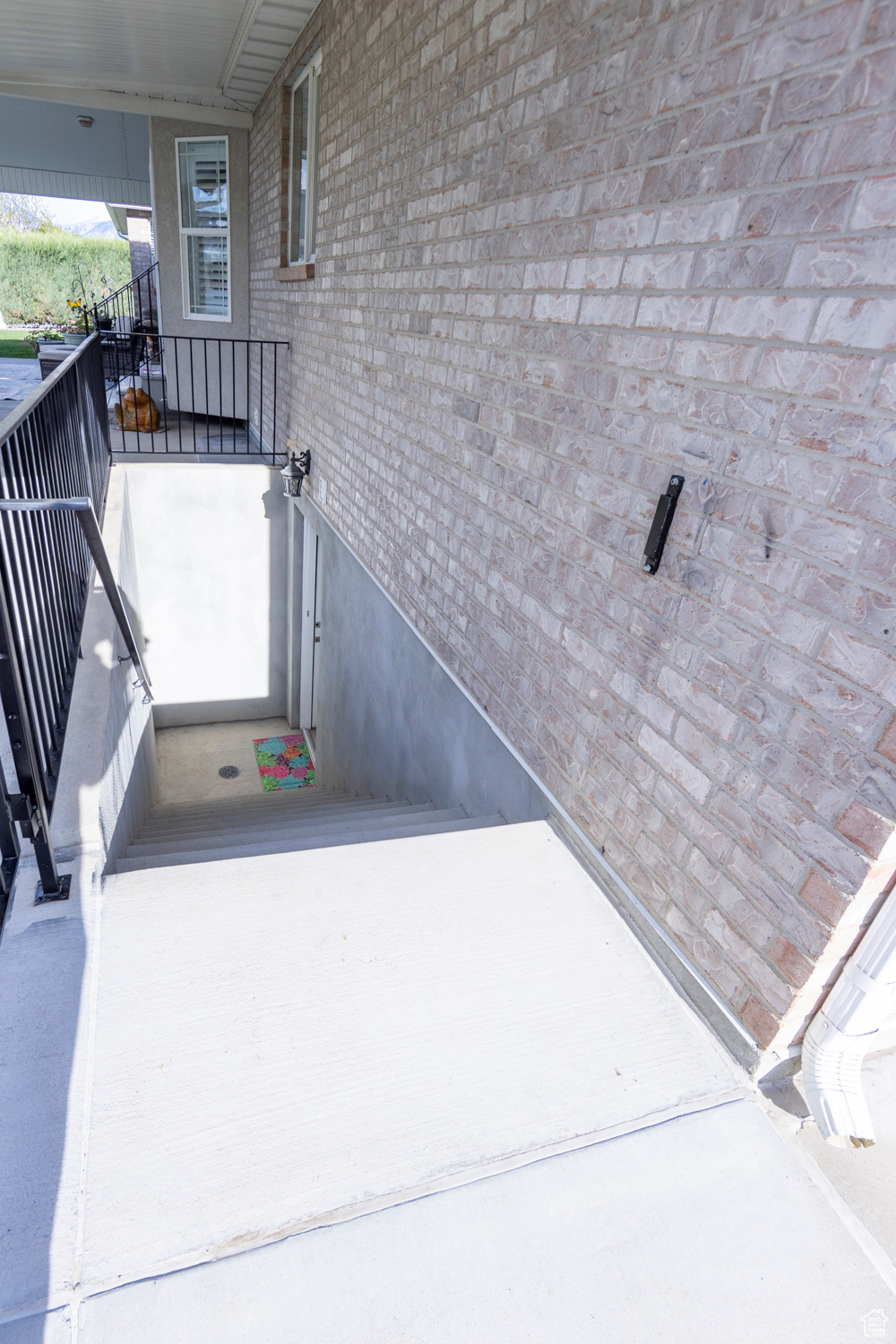 Exterior stairs with a separate entry into the basement.