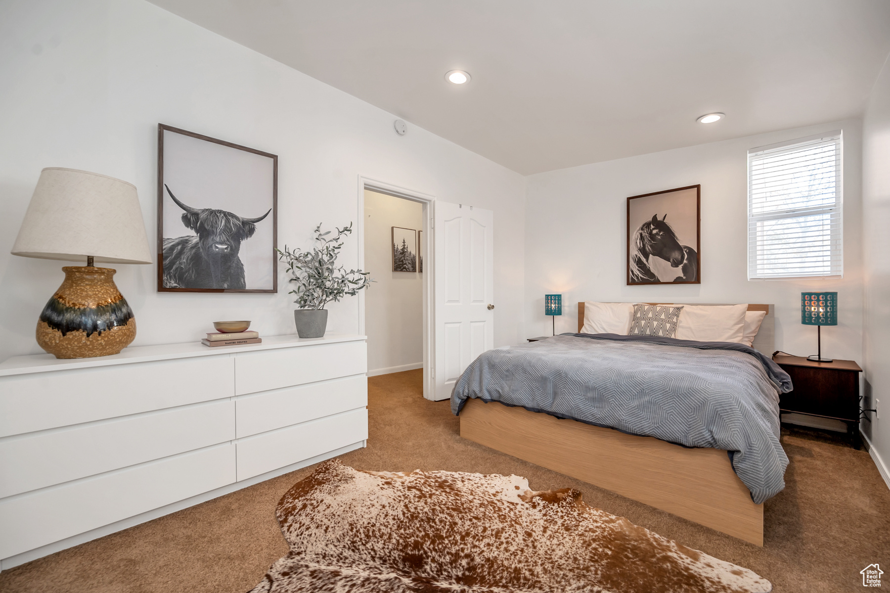 Bedroom with light carpet