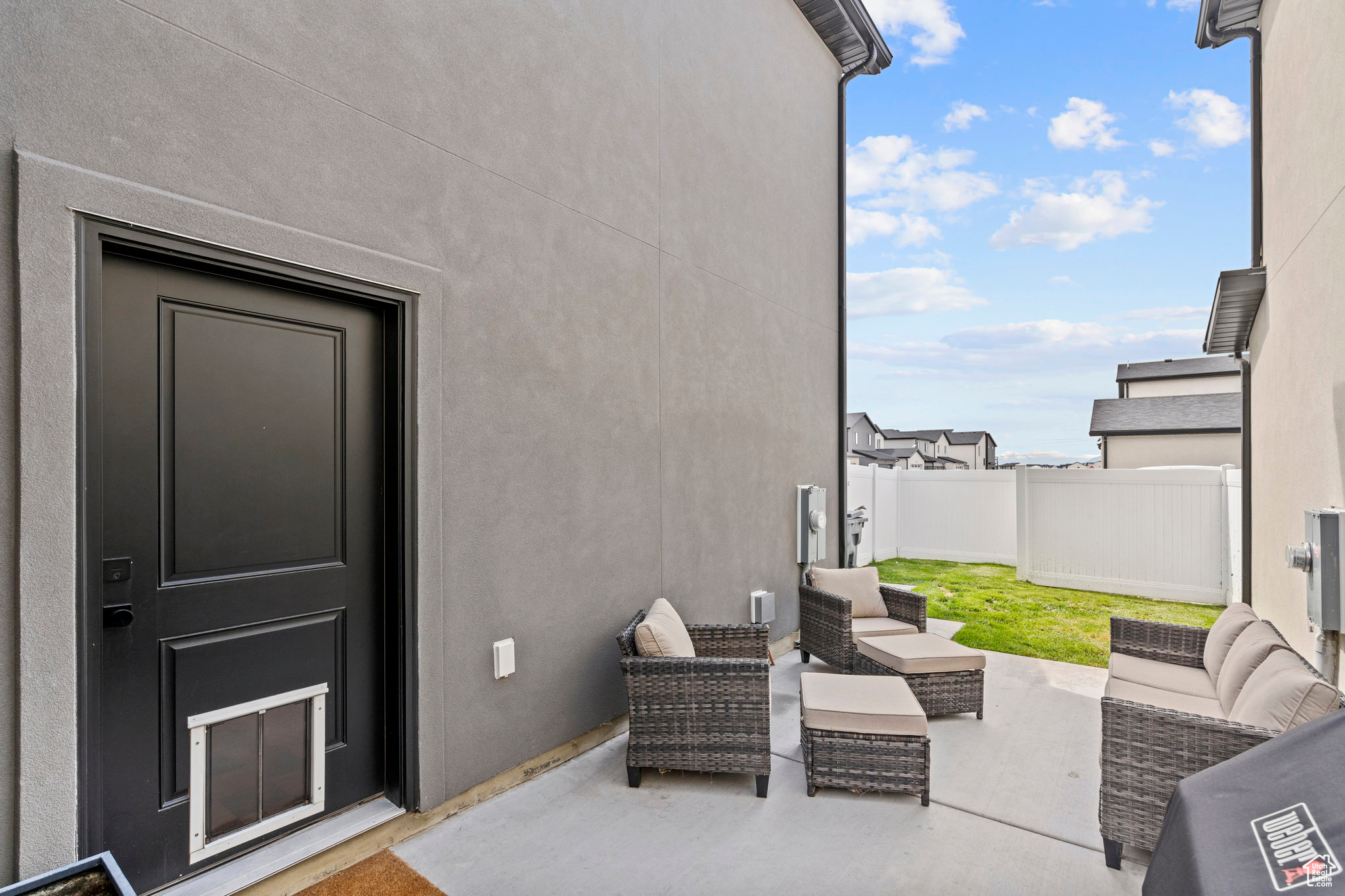 SIDE DOOR AND PATIO AREA