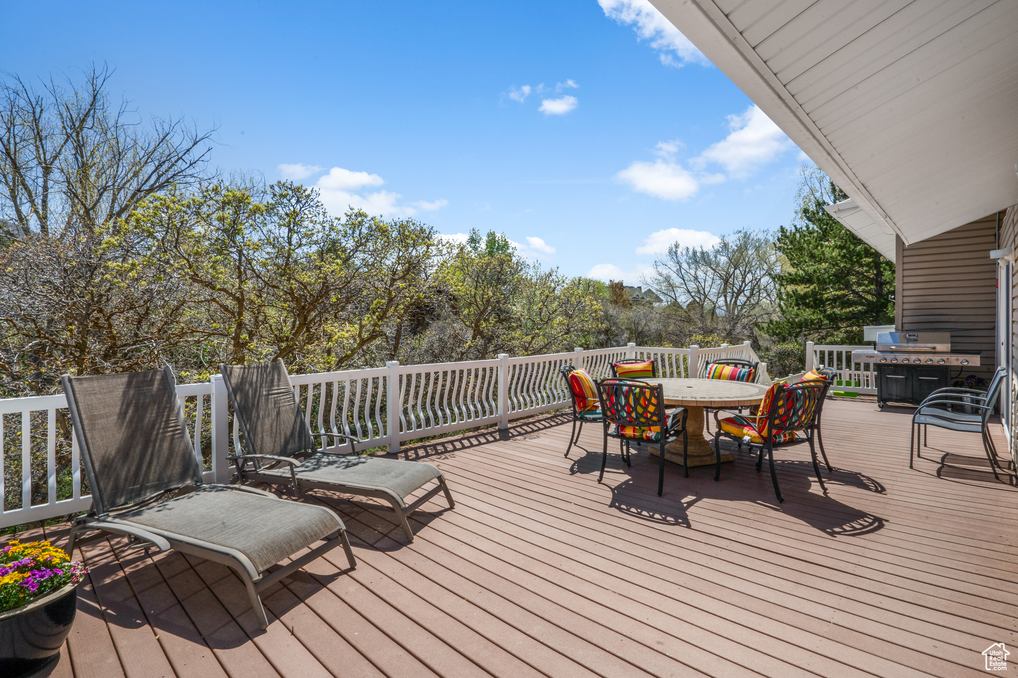 Step outside onto this Deck from formal dining and kitchen