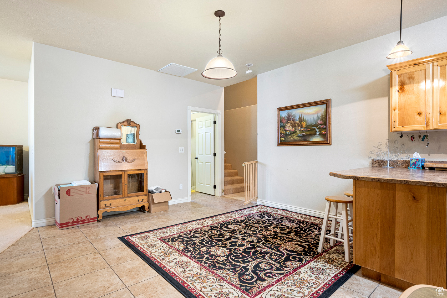 Dining room with light tile floors