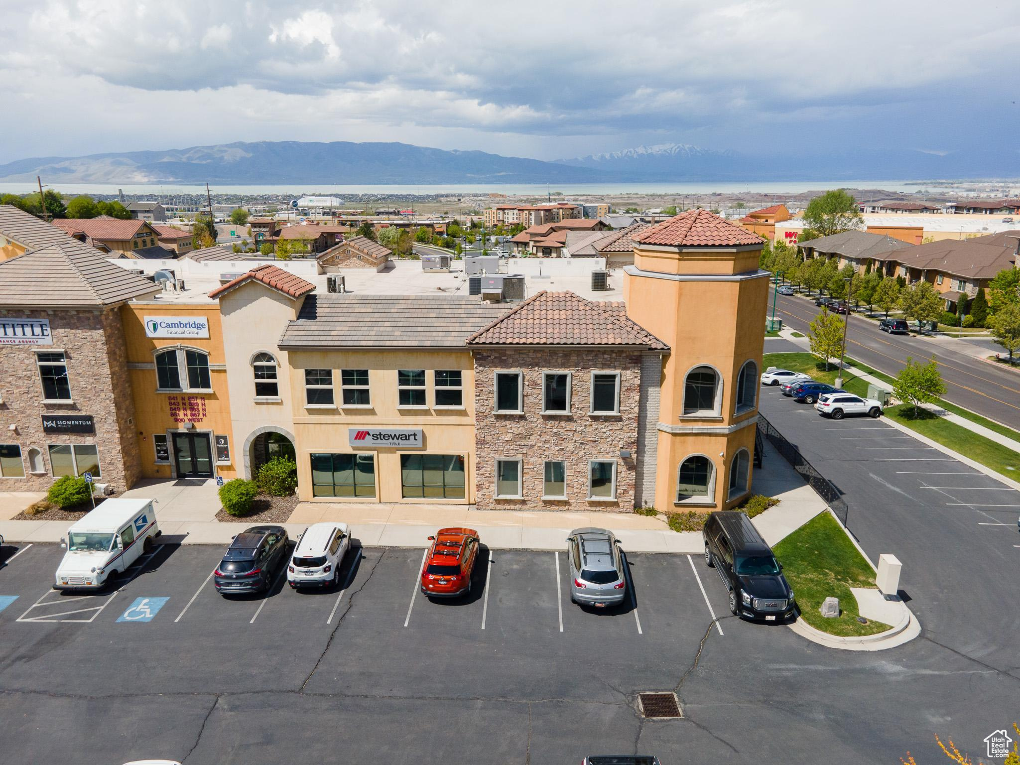 View of property with a mountain view