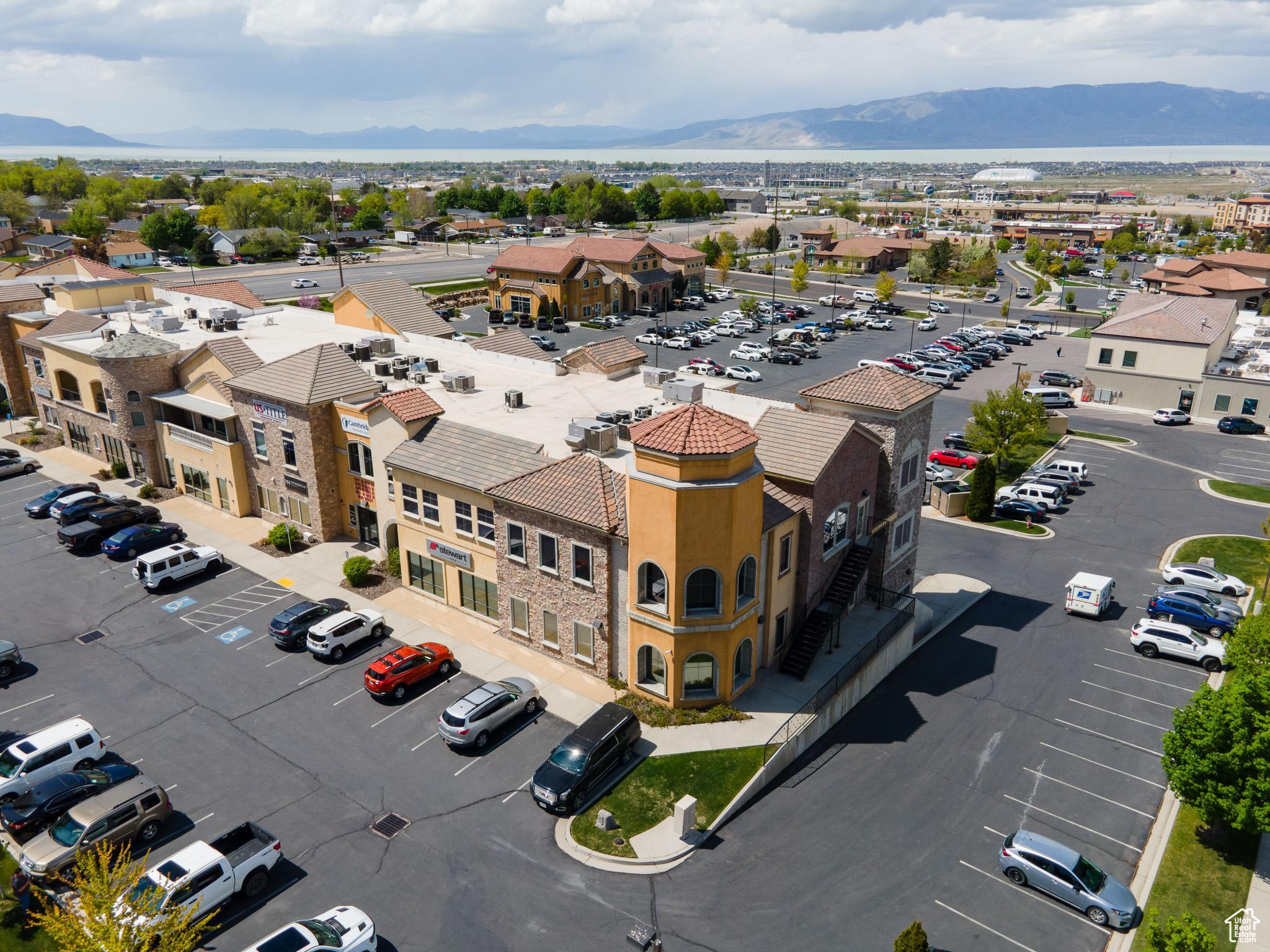 Birds eye view of property with a mountain view