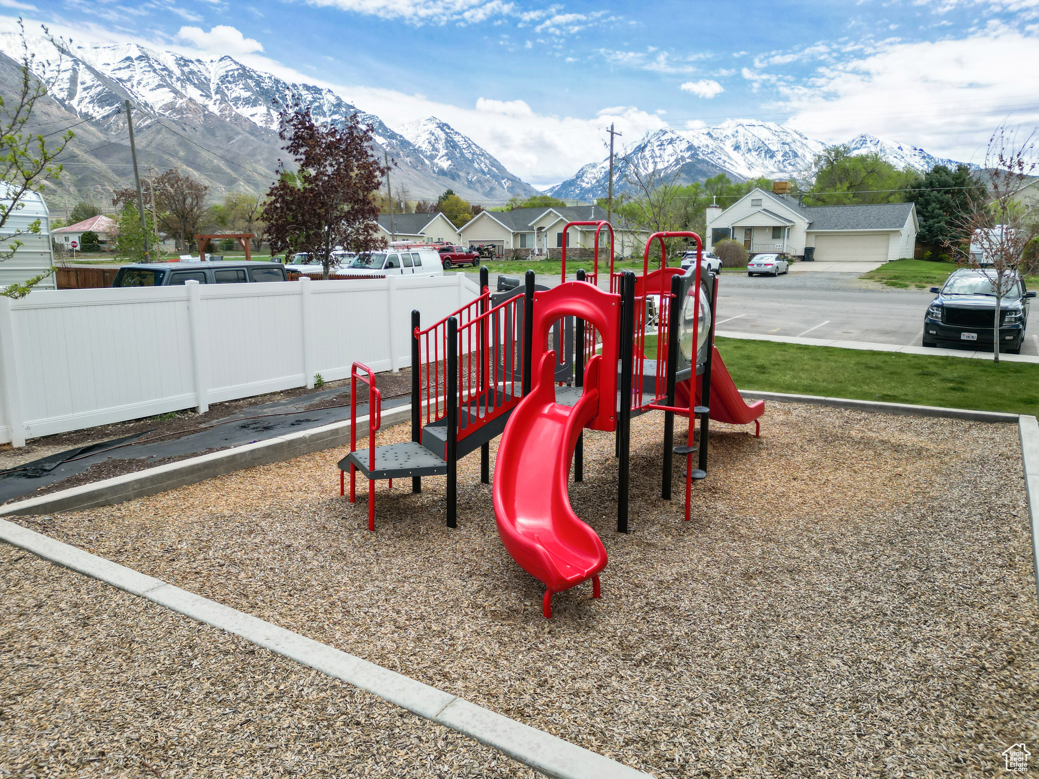 View of playground with a mountain view