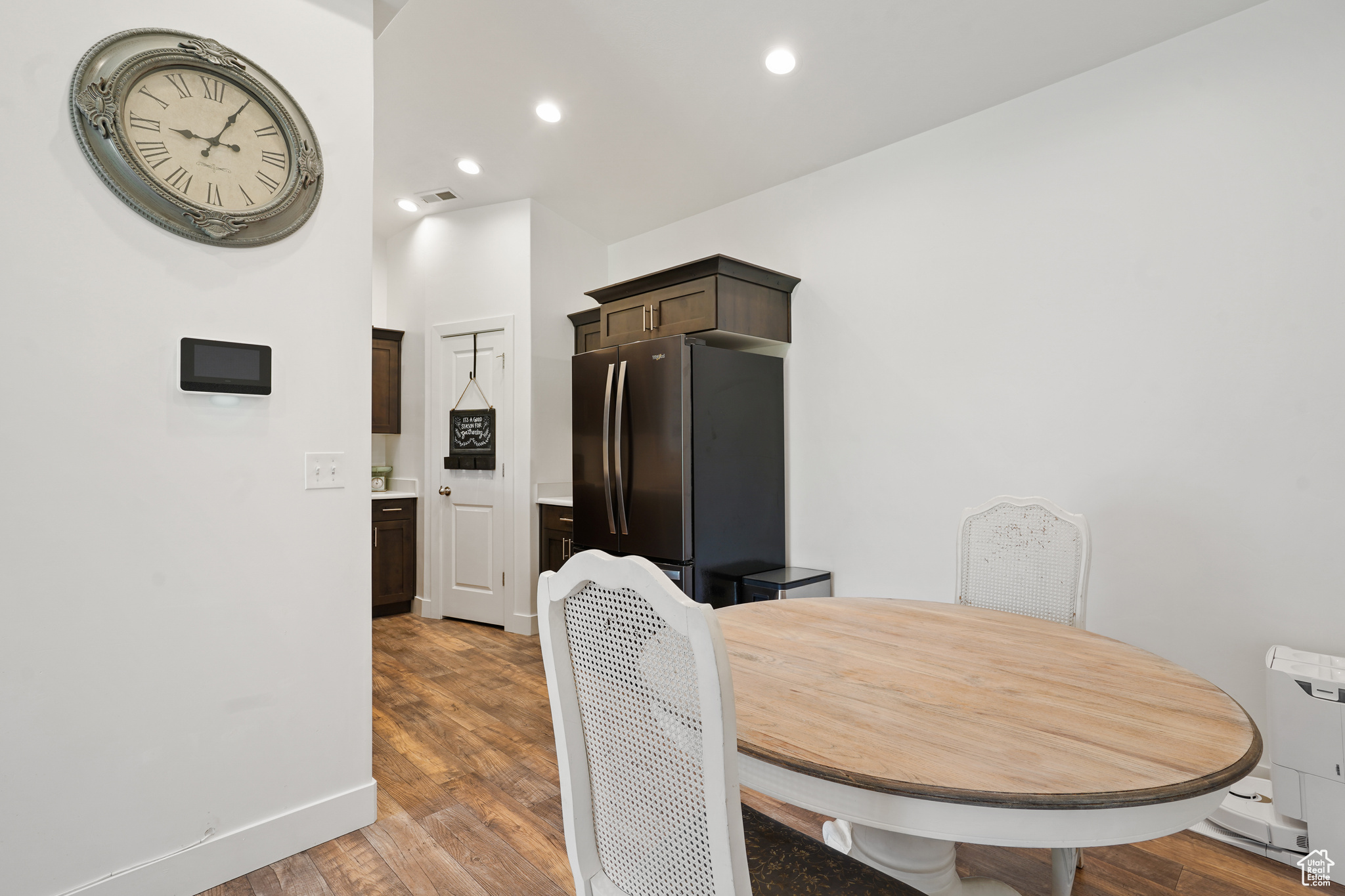 Dining area featuring wood-type flooring