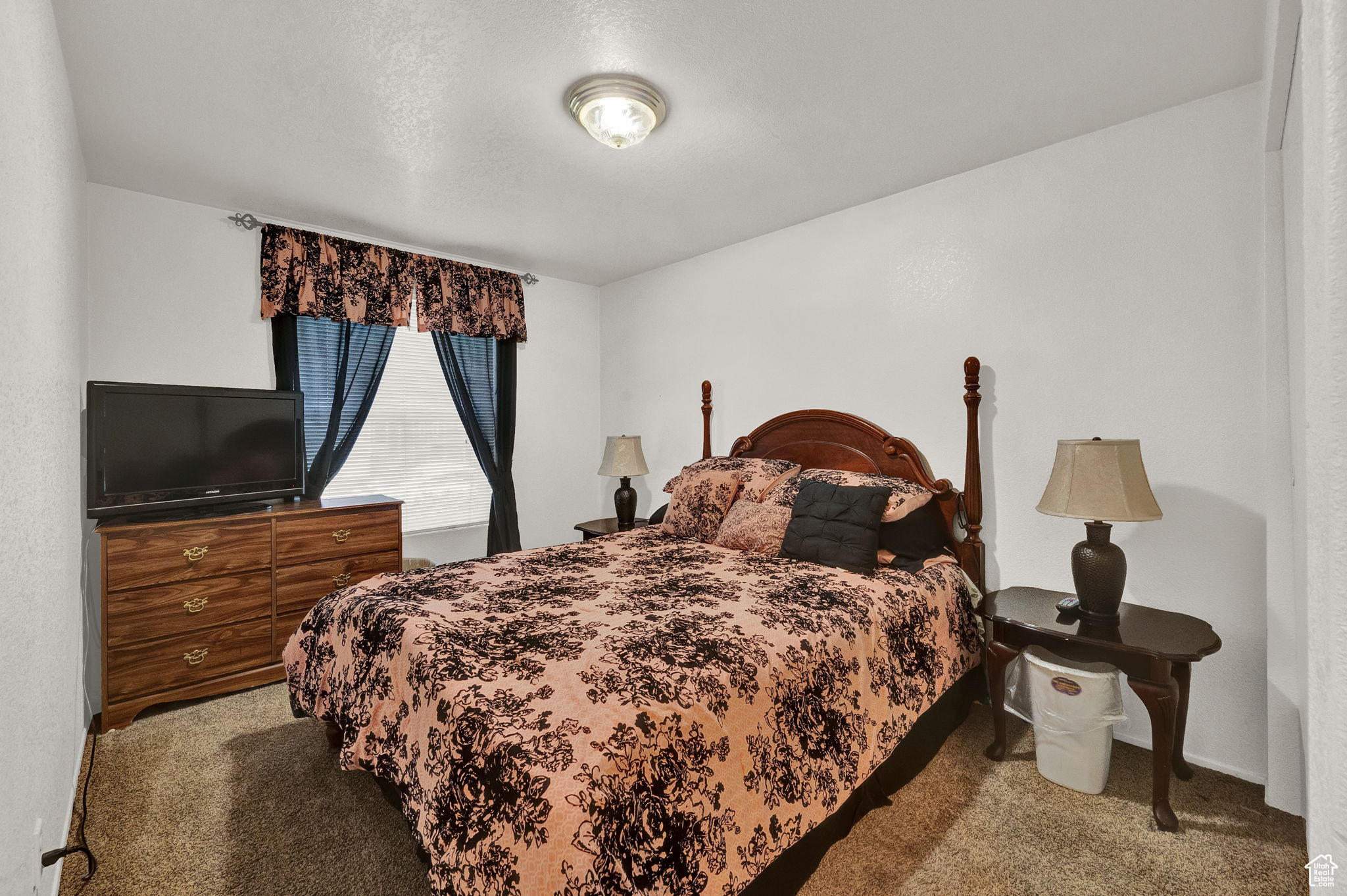 Bedroom featuring carpet