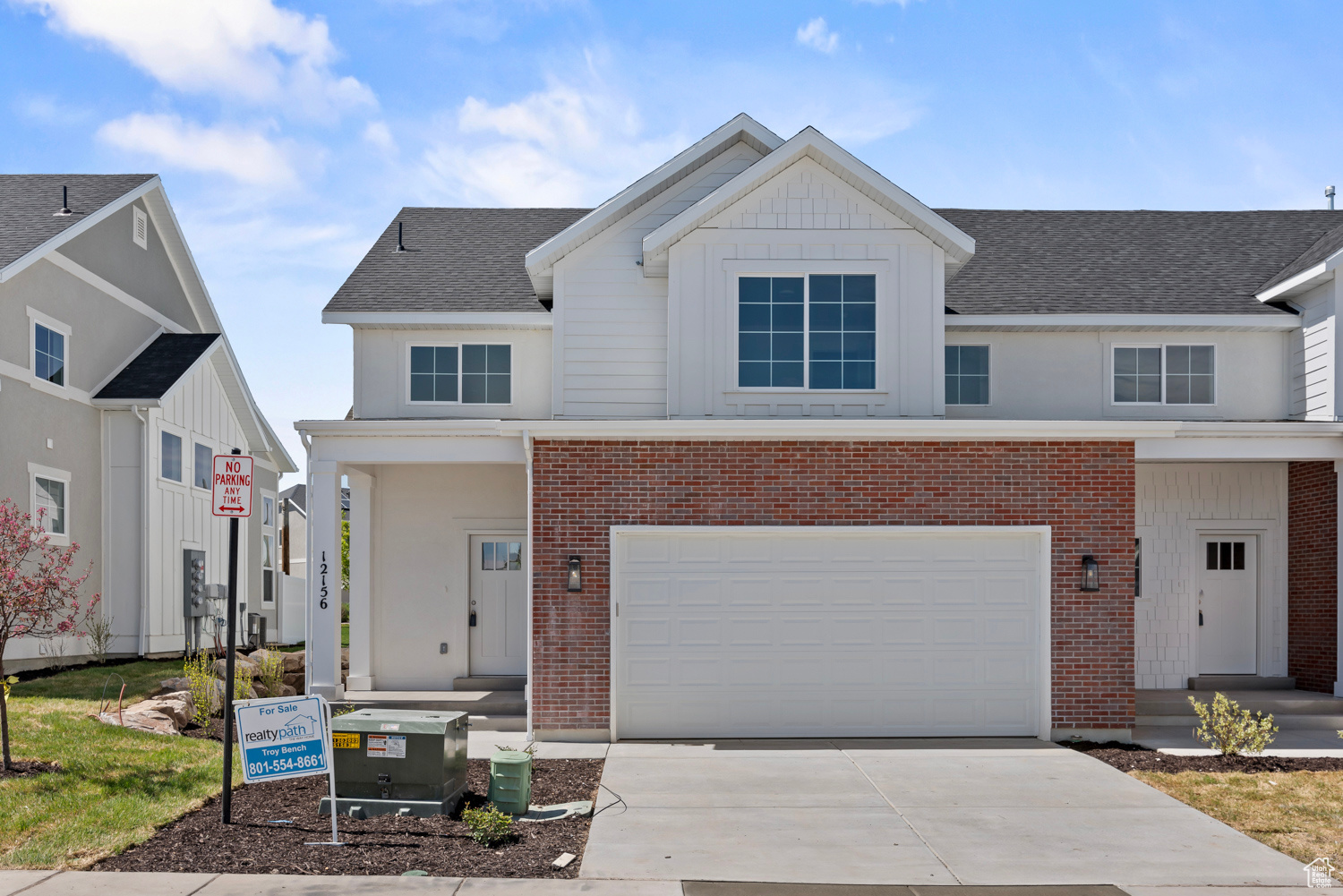 View of front of home featuring a garage