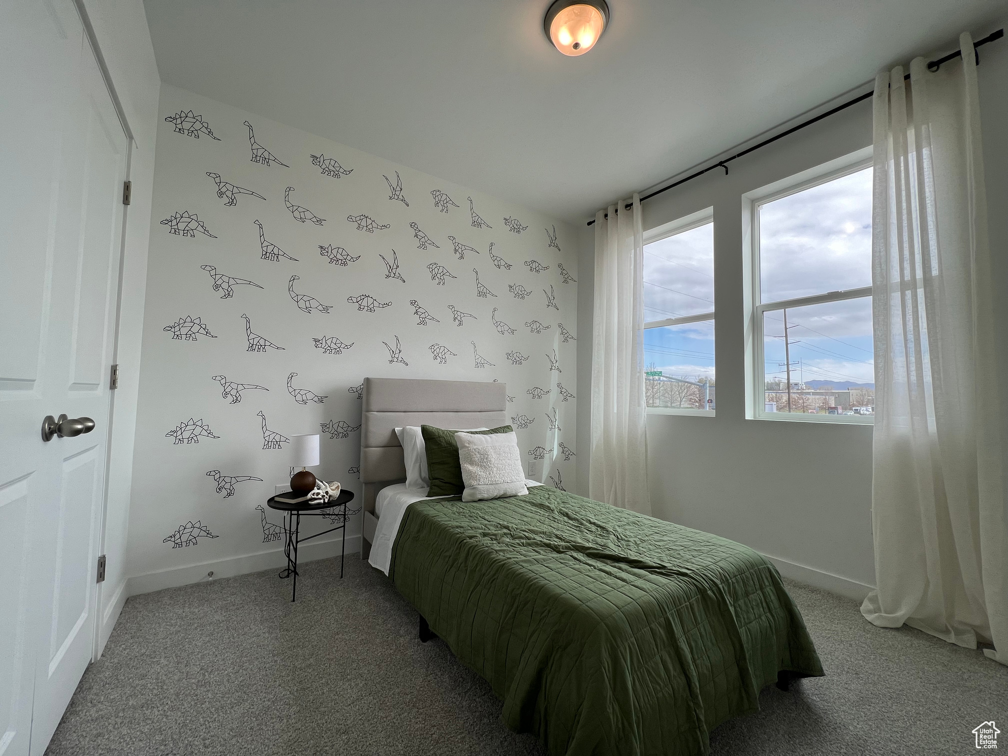 Bedroom featuring carpet floors