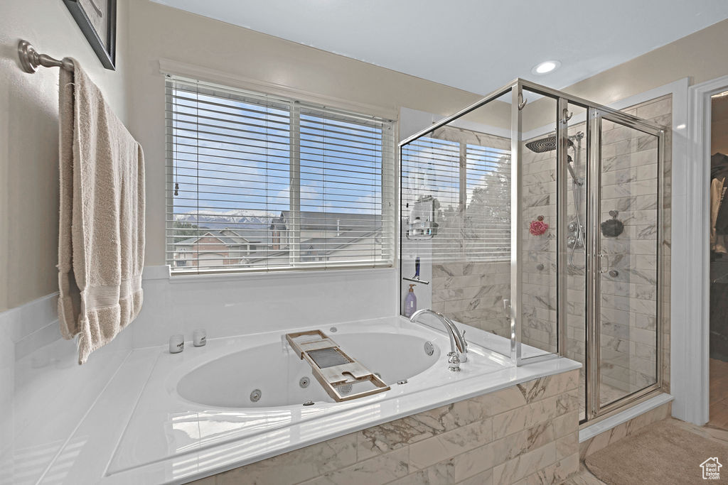 Master Bedroom with walk in shower and jetted tub