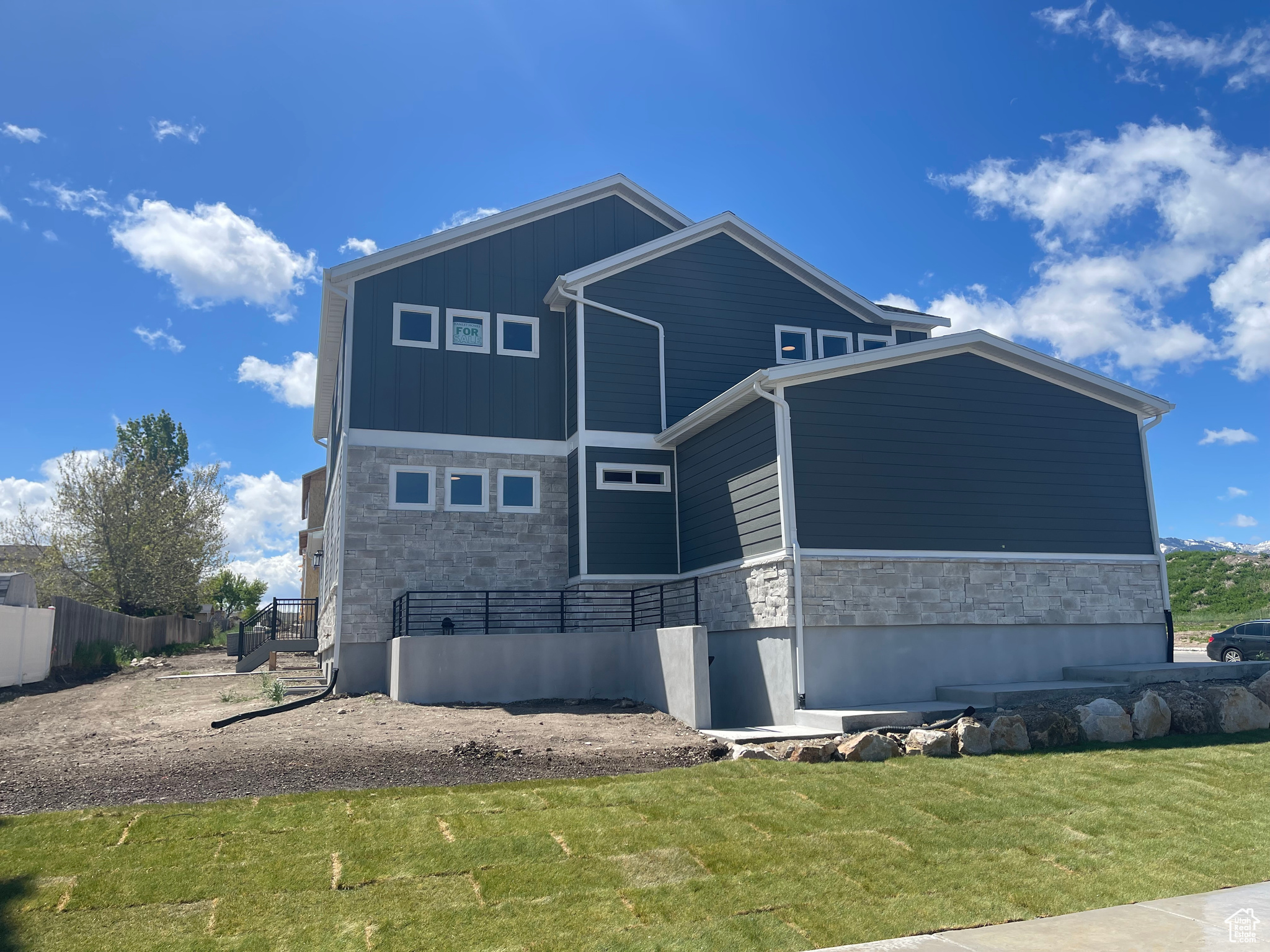 View of front of house with a front lawn