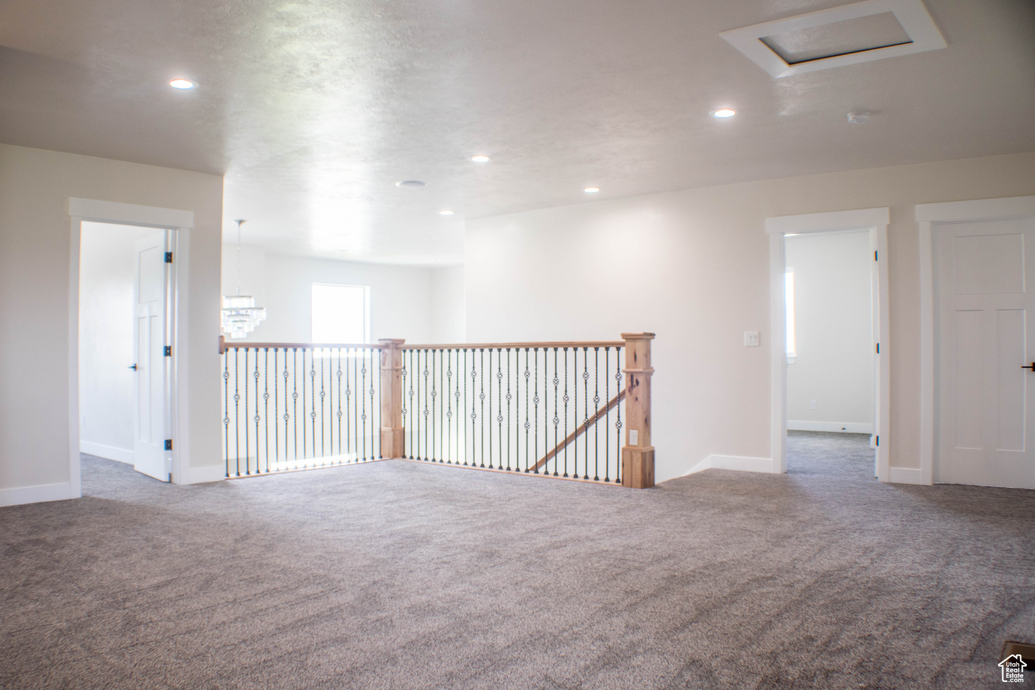 Spare room featuring carpet floors