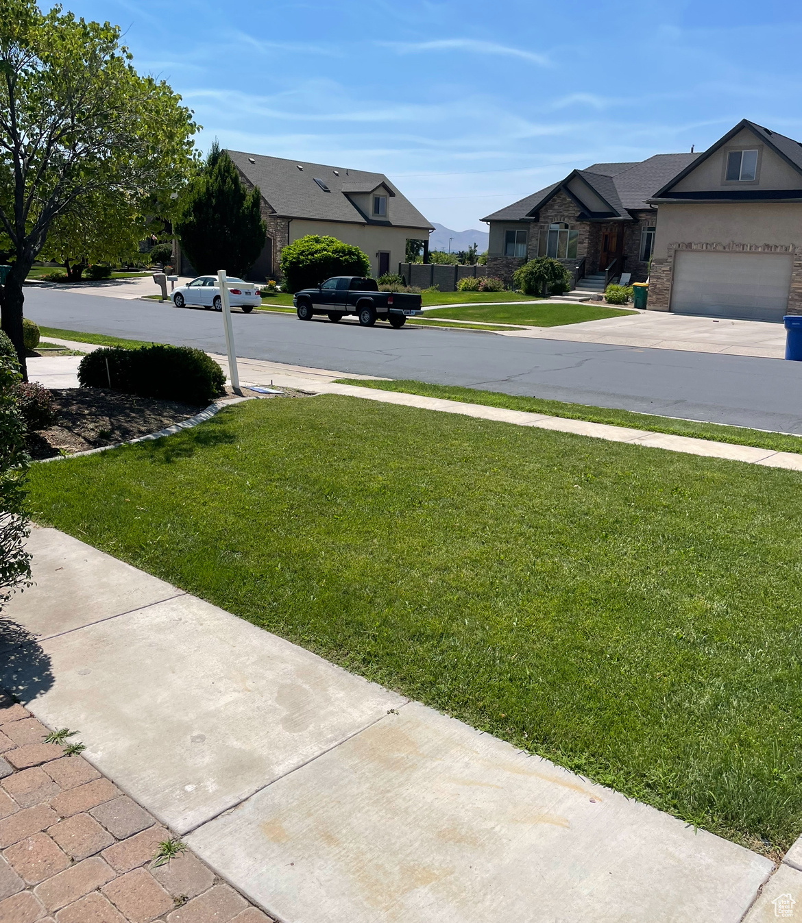 View of yard with a garage