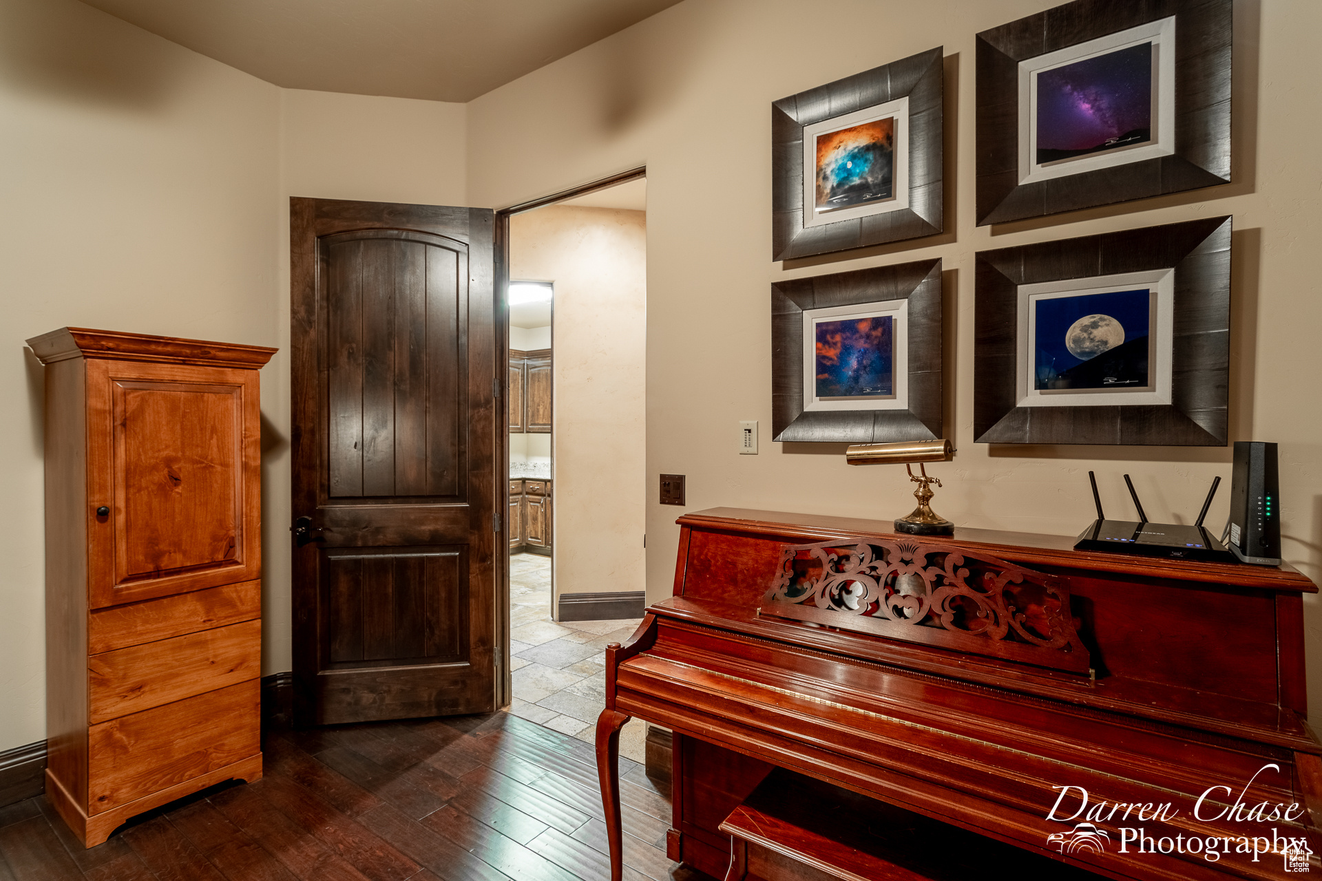 Office room with hardwood / wood-style flooring