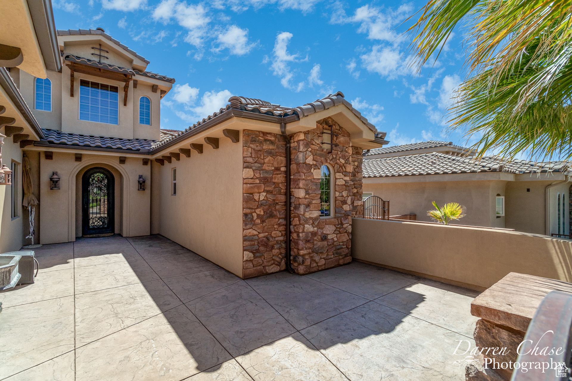 Mediterranean / spanish house with a patio