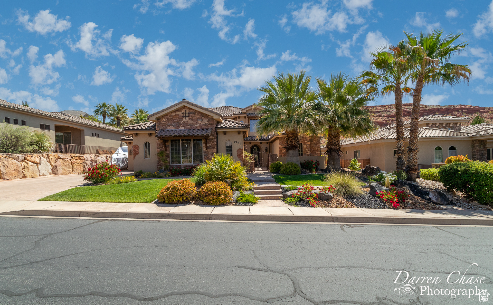 Mediterranean / spanish home featuring a front lawn