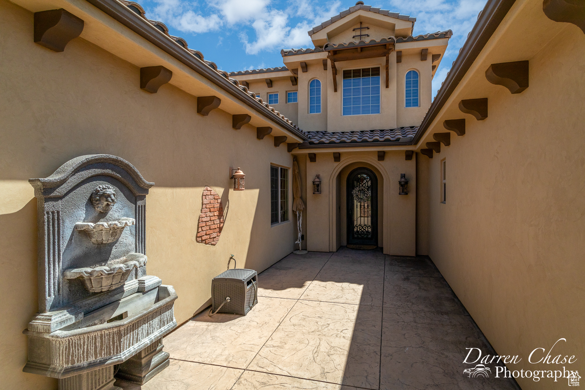 Entrance to property with a patio area