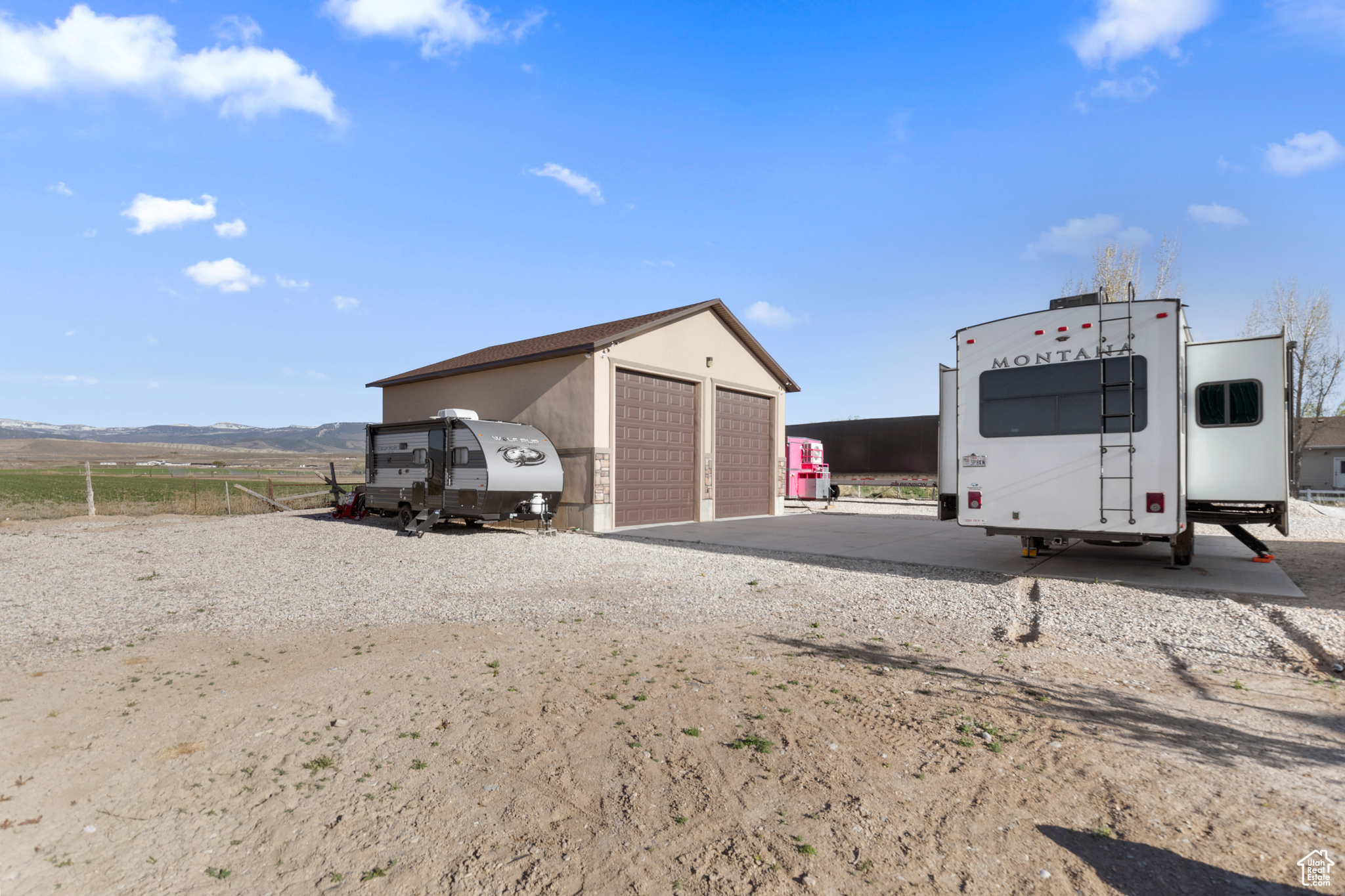 View of outdoor structure with a garage