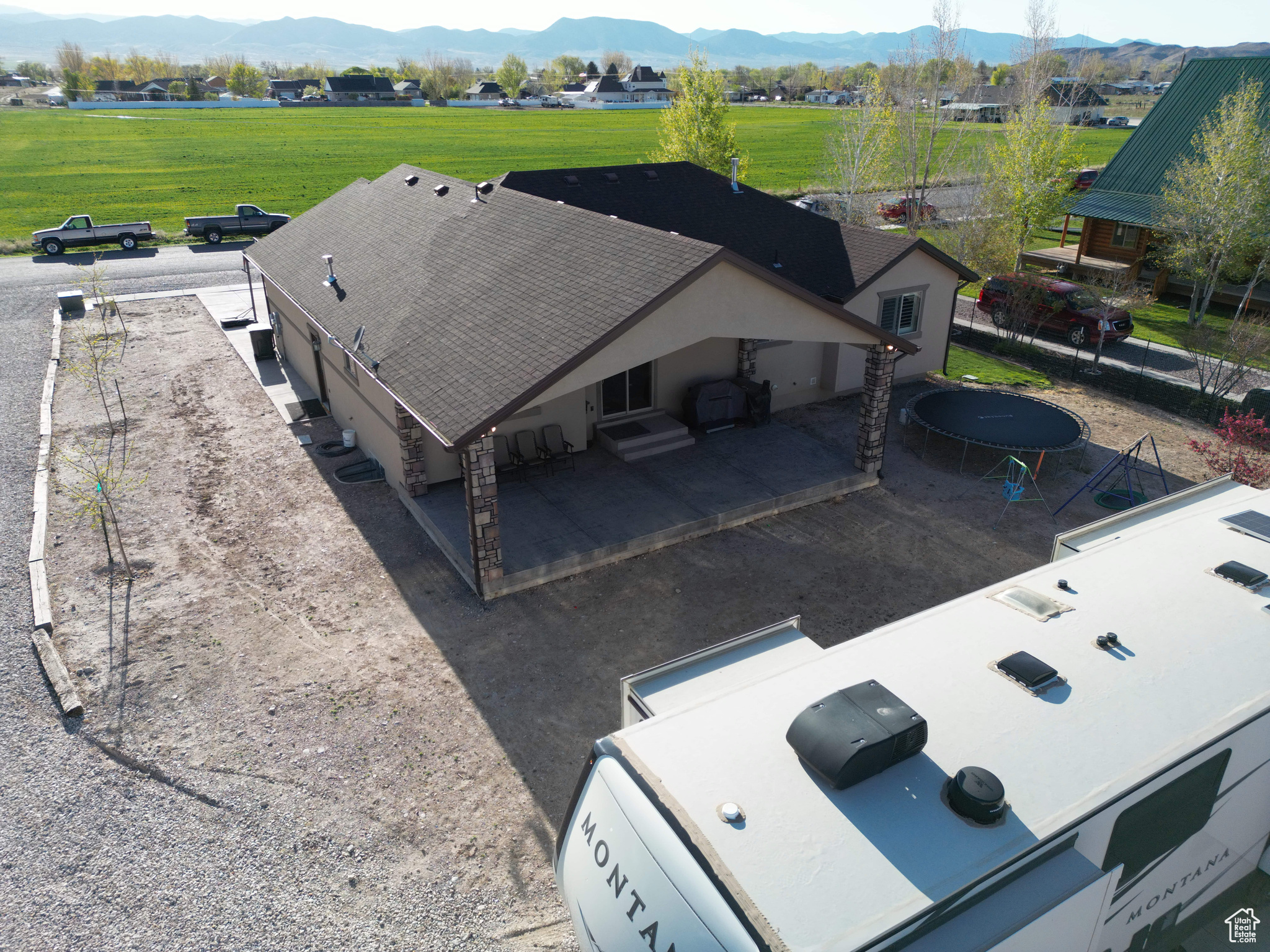 Birds eye view of property with a mountain view