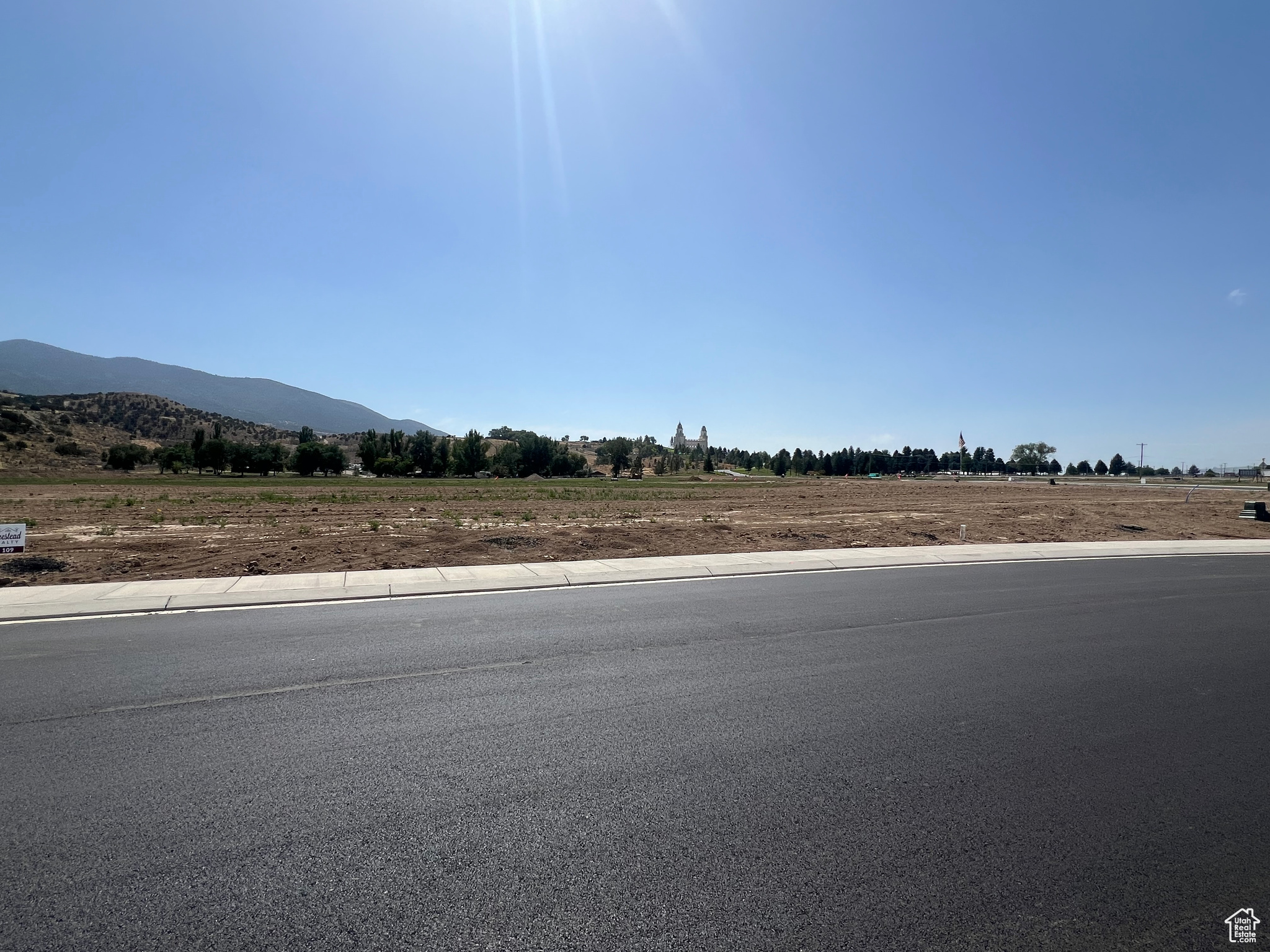 View of road with a mountain view and a rural view