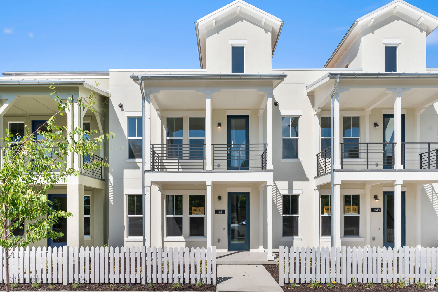 View of front of home with a balcony