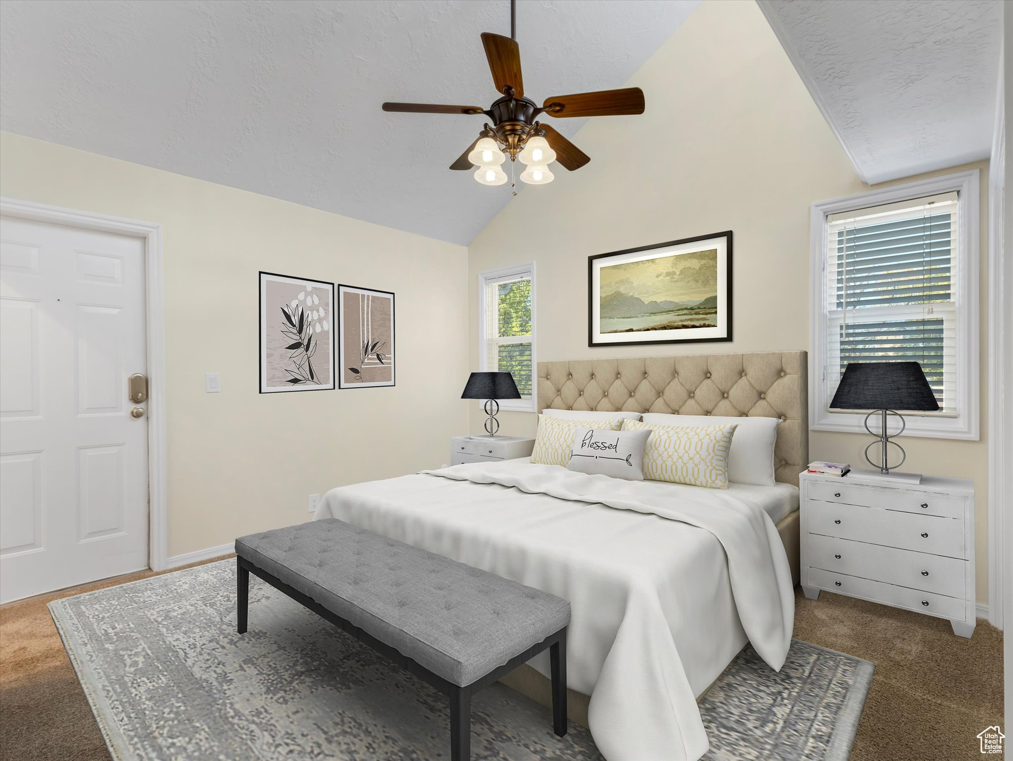 Bedroom featuring lofted ceiling, ceiling fan, and carpet