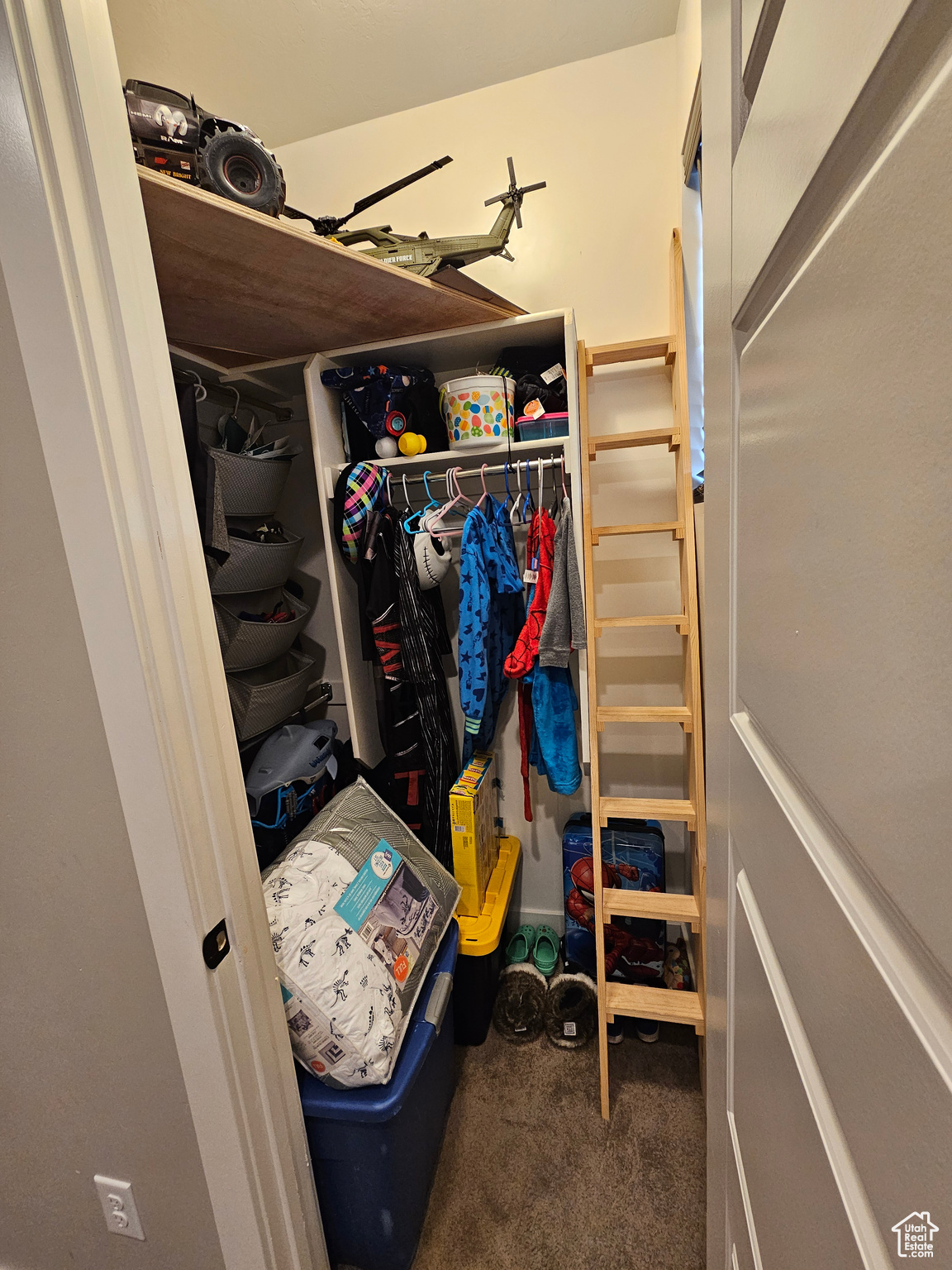 Walk in closet in bedroom 1 on main level. Stairs to a good hiding spot for kids.