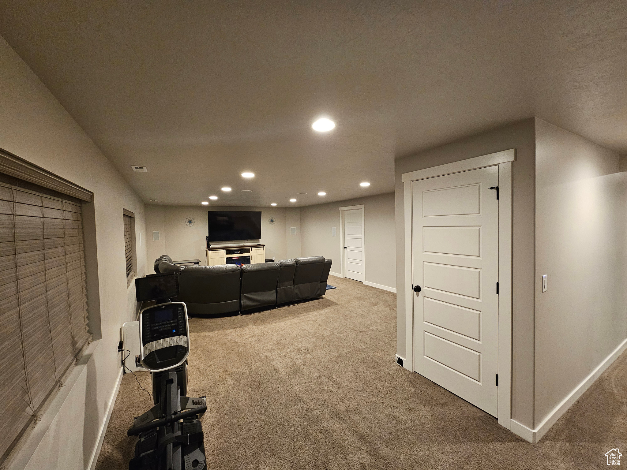 Entrance to family room at the bottom of the stairs