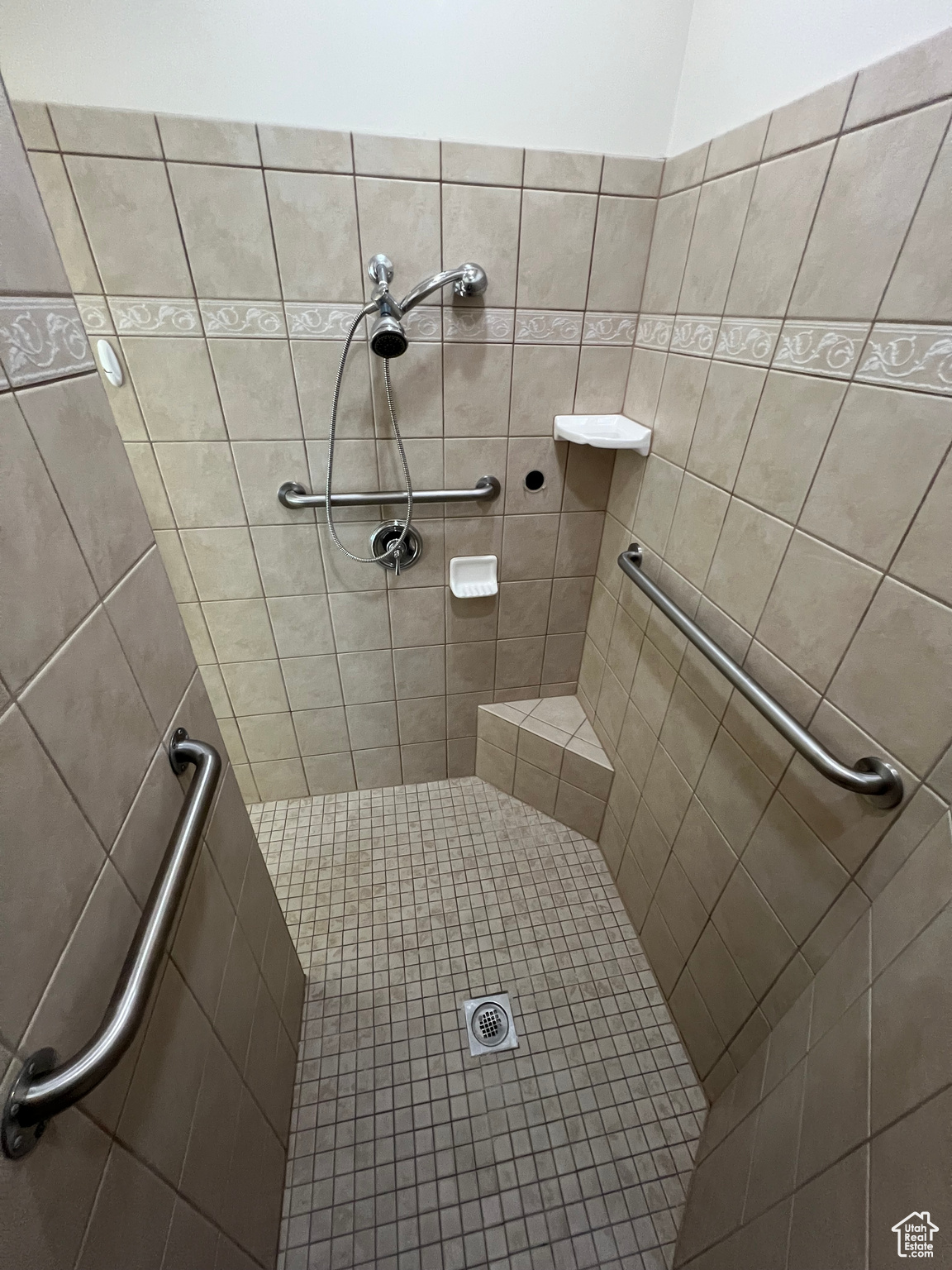 Extra Large Bathroom with a tile shower and two benches