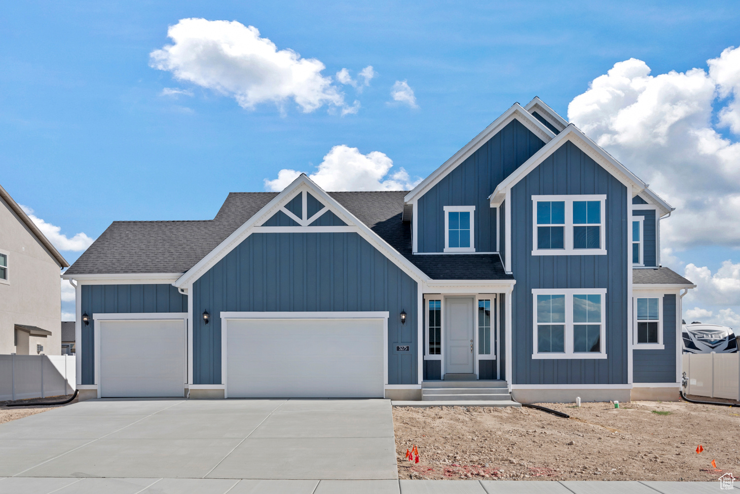 View of front of property with a garage