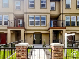 View of property featuring a balcony