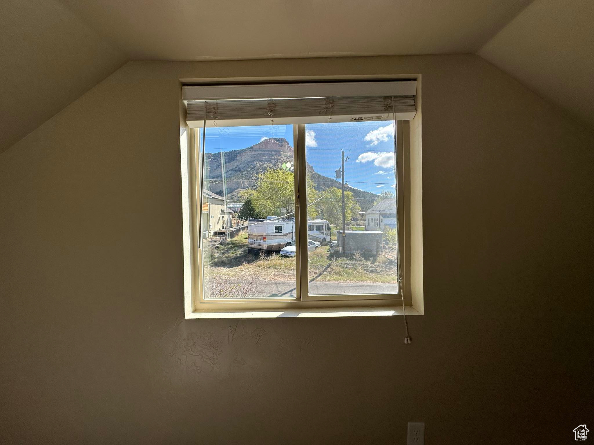 Interior space featuring vaulted ceiling