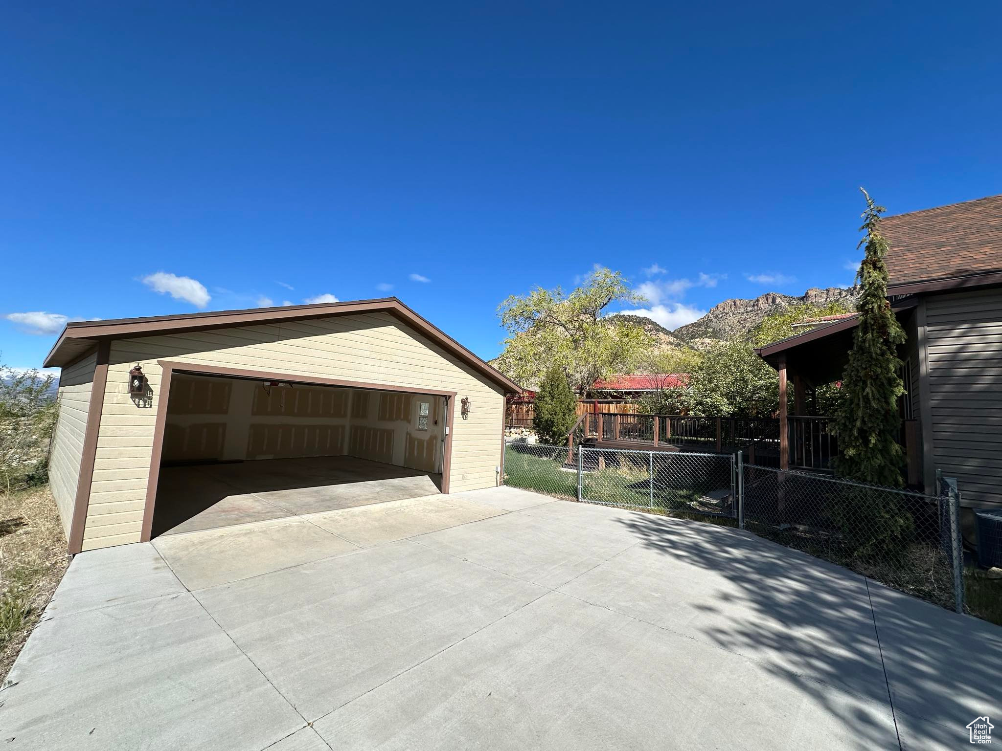 Garage featuring a mountain view