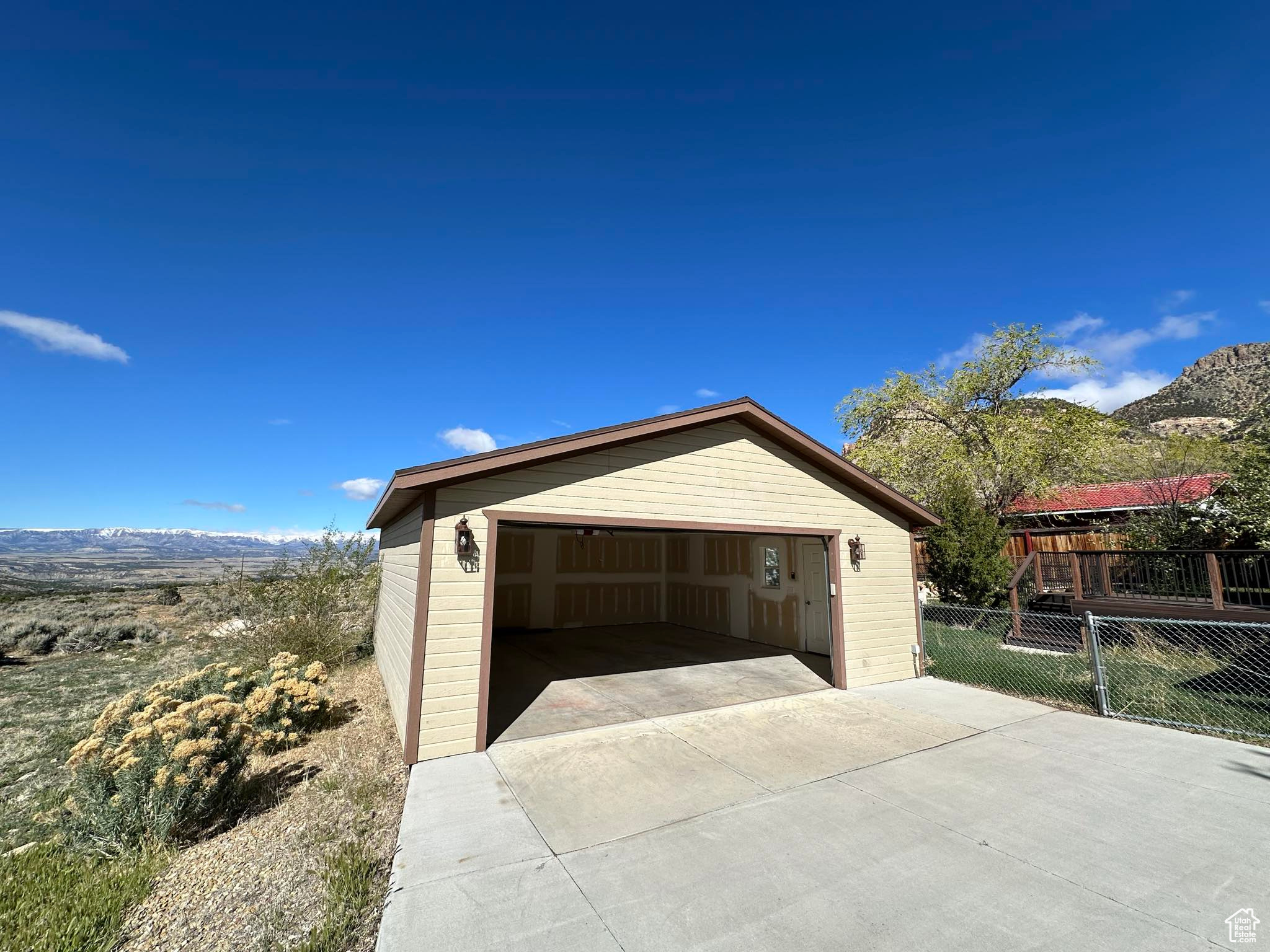 Garage featuring a mountain view