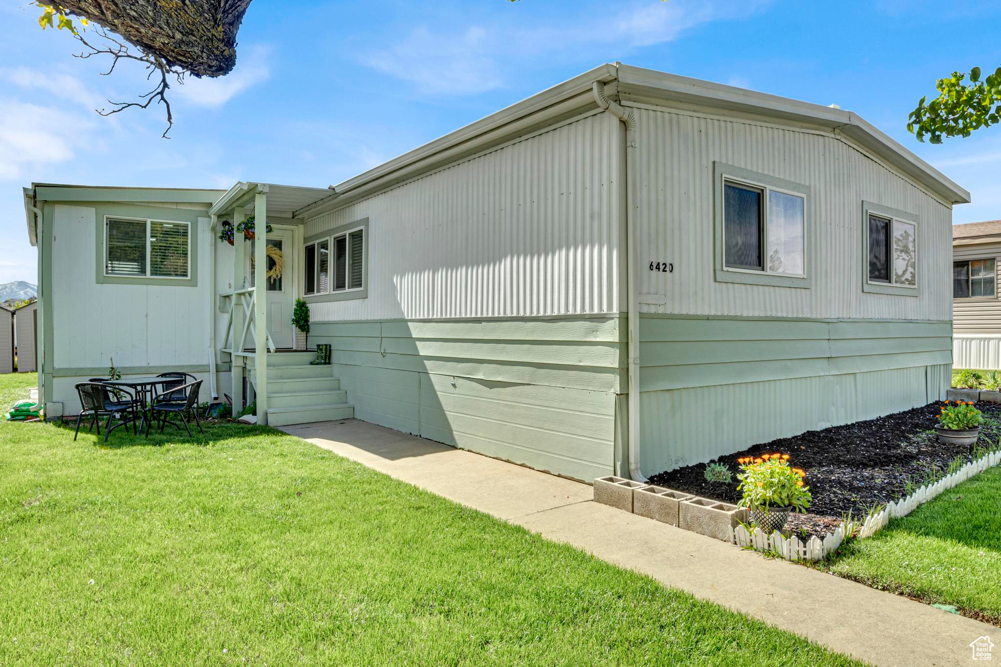 Exterior space featuring a lawn