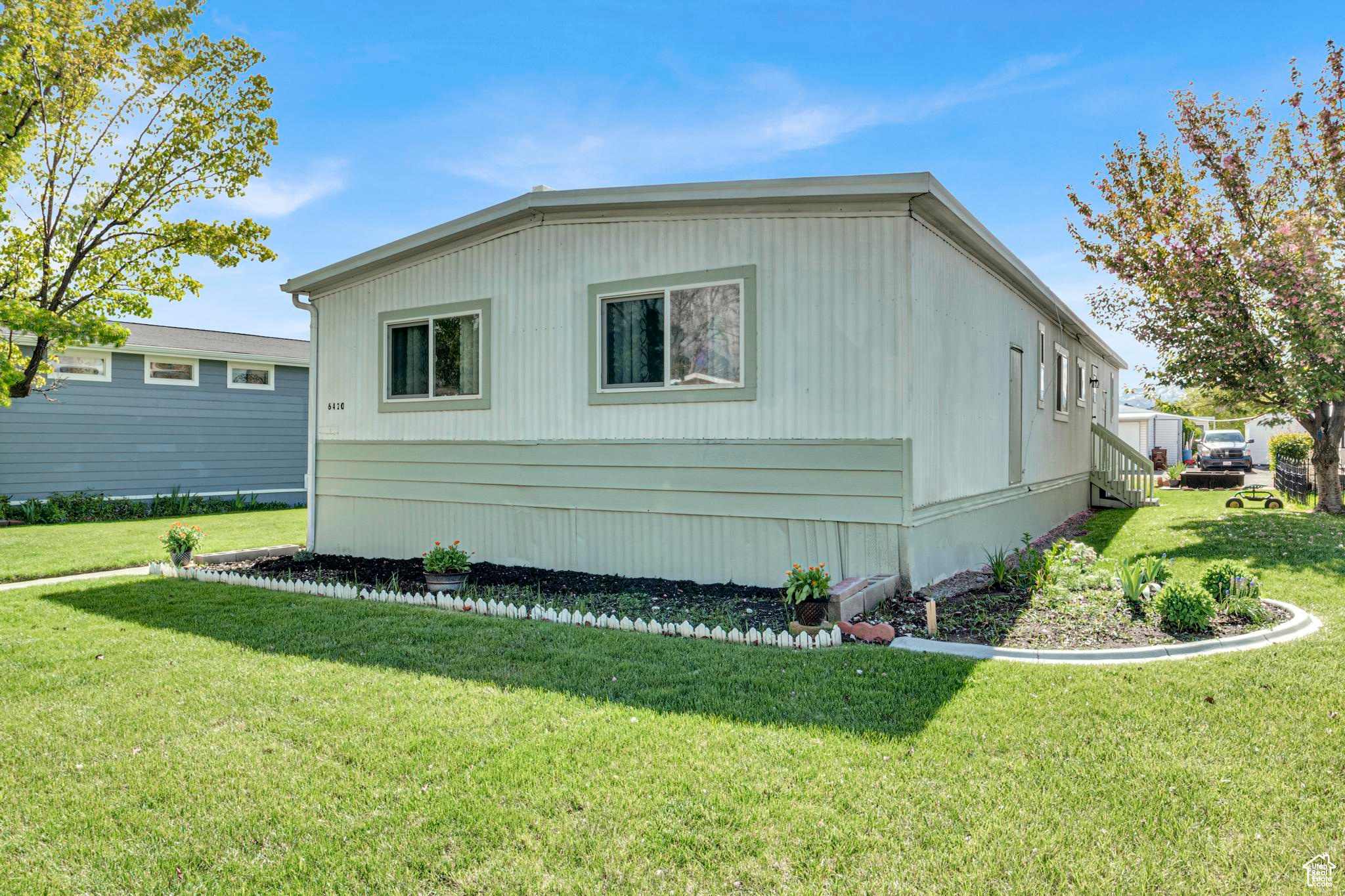 View of home's exterior with a lawn